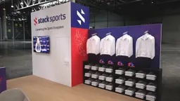 20x20 Island booth design by Reaction Space